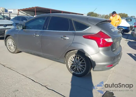 2013 Ford Focus Titanium z USA, uszkodzony, nr VIN 1FADP3N20DL277007